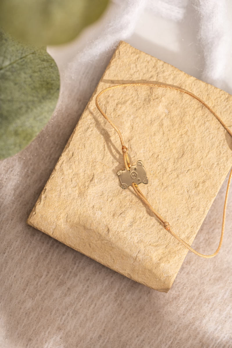 Šňůrkový náramek Bear Baby z růžového zlata 585